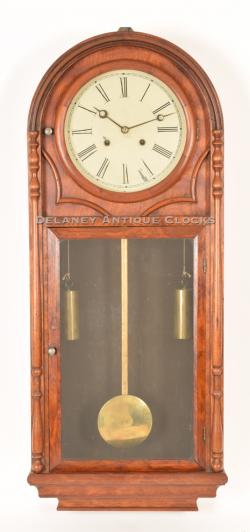 Atkins Clock Company of Bristol, Connecticut. A "Very Rare Circa 1876 Round Top 8-day Regulator." 216024.