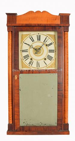 Jason R. Rawson of Holden, Massachusetts. A tiger maple decorated Pillar & Splatt shelf clock with a time, strike, and alarm wooden geared movement. 221110.